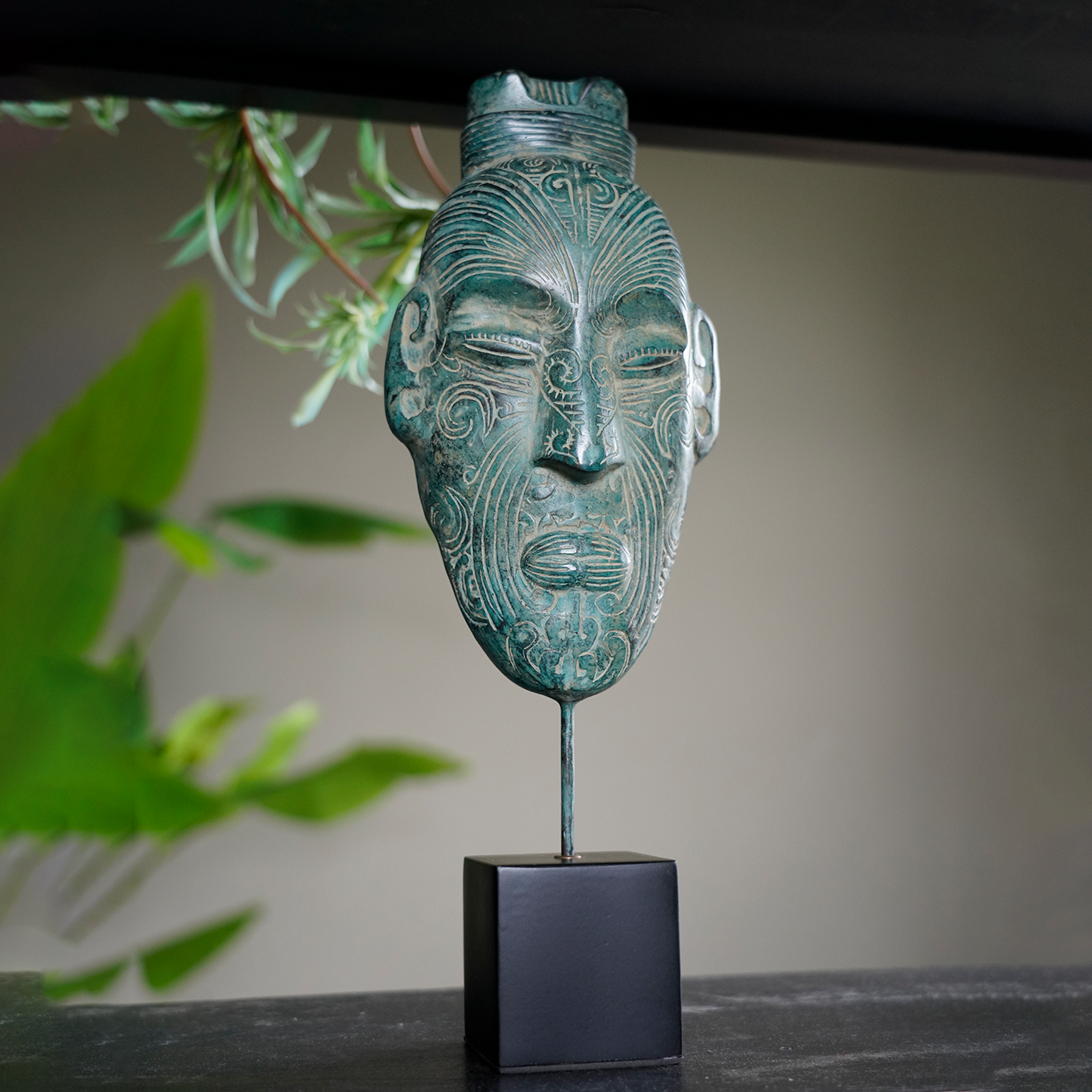 Maori Mask on Stand Green patinated