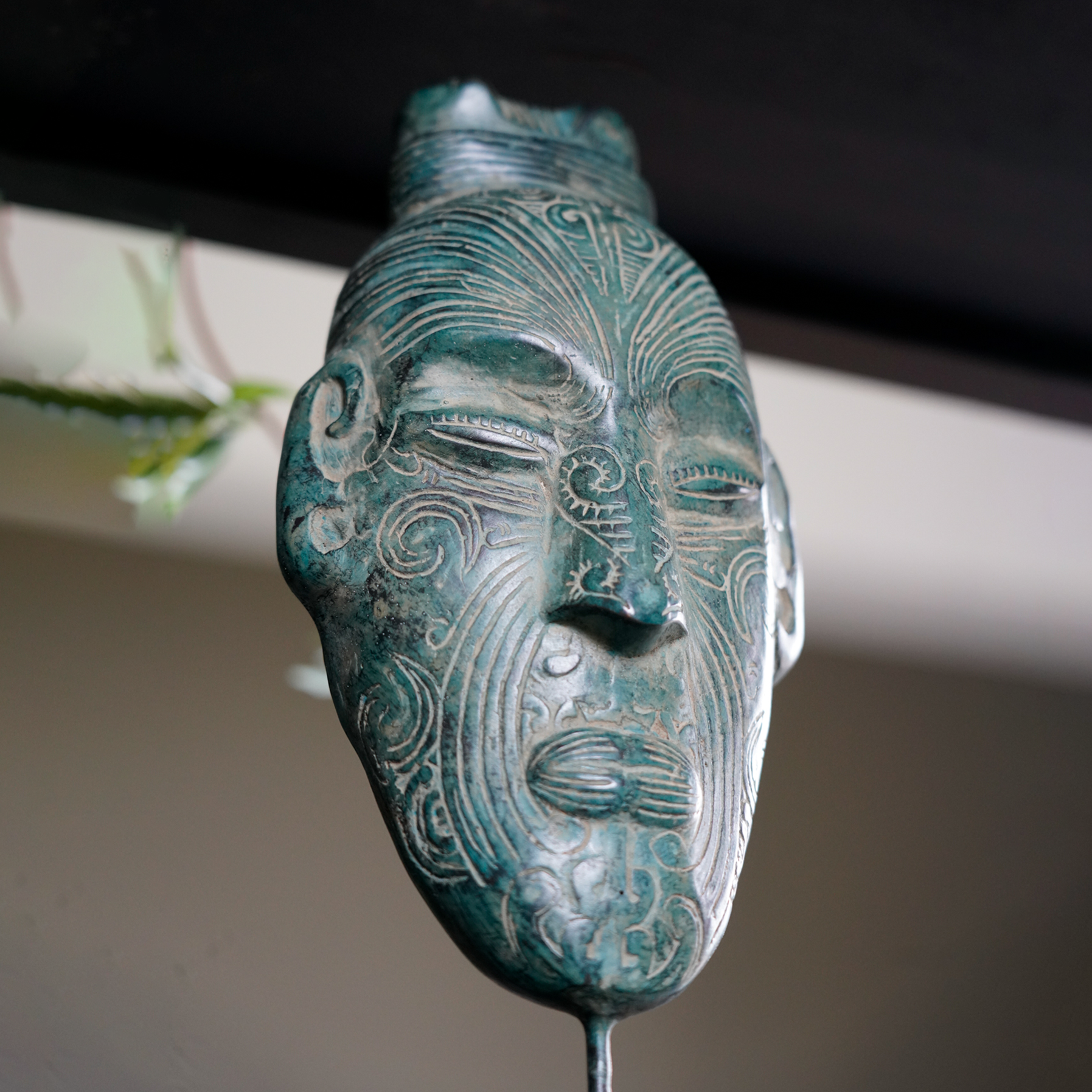 Maori Mask on Stand Green patinated