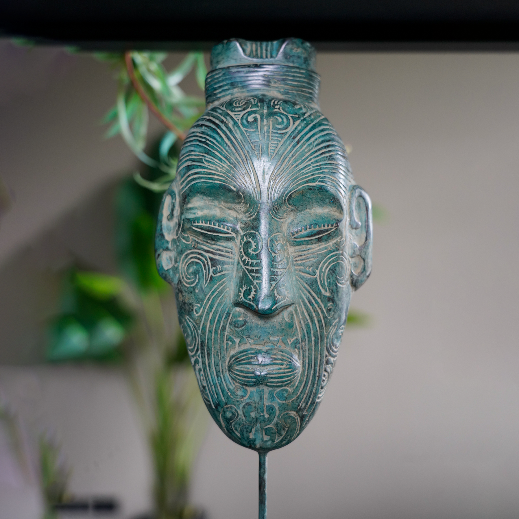 Maori Mask on Stand Green patinated