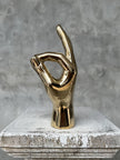 Hand O.K. Polished Brass