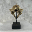 Leopard Snow Polished Bronze on a Stand