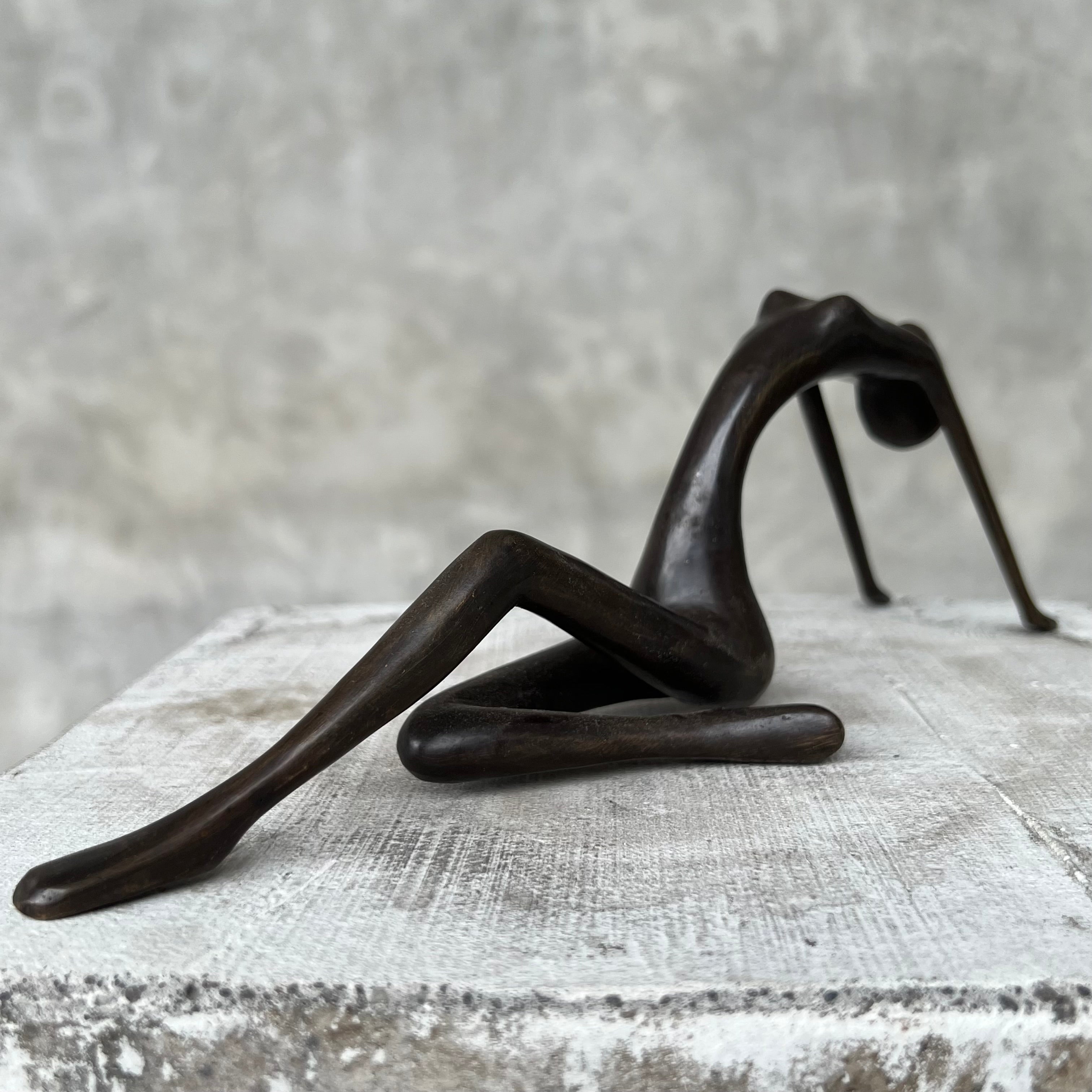 Stretching Lady Bronze Sculpture Blue Patinated