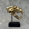 Leopard Snow Polished Bronze on a Stand