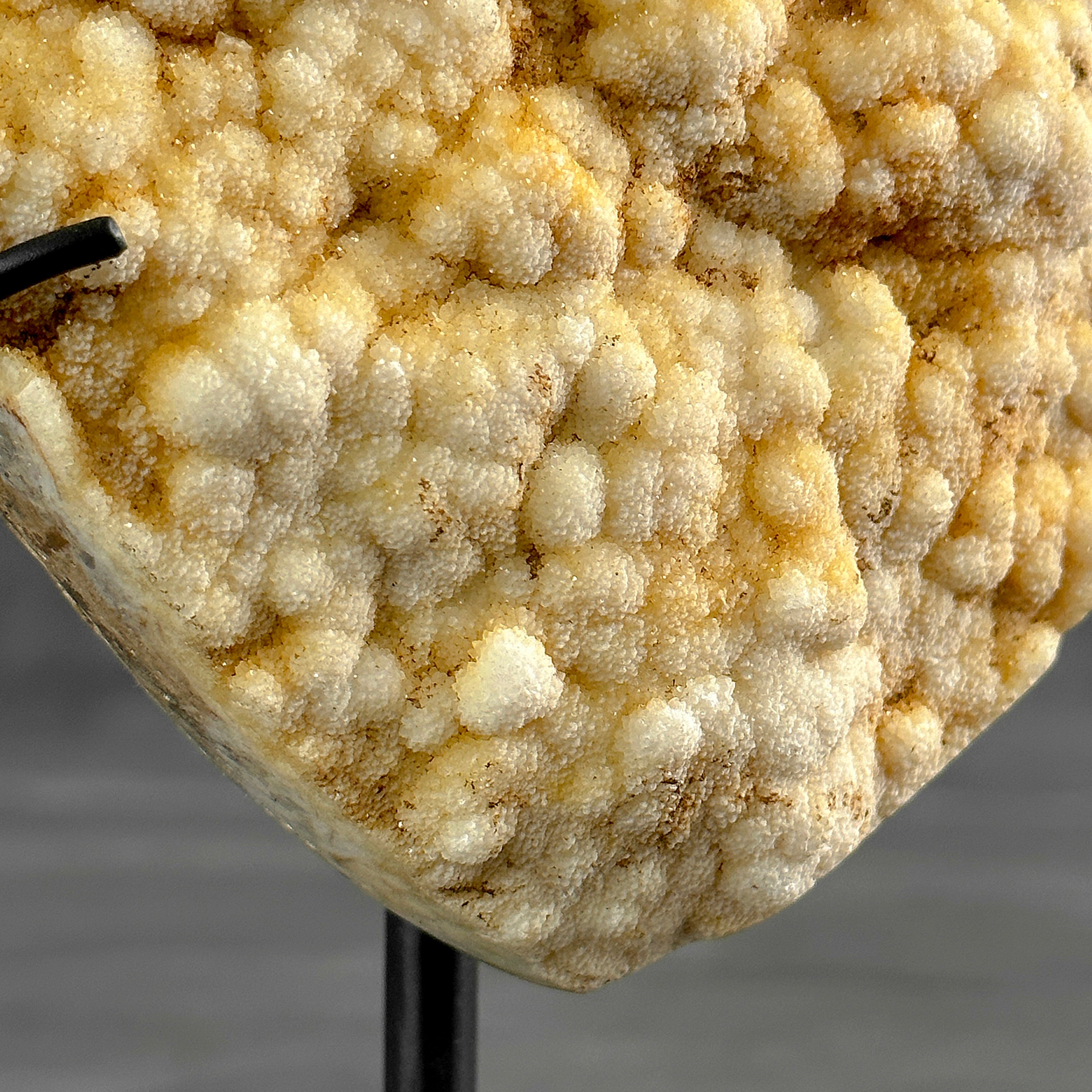 Stunning Heart Shape of Yellow Crystal Rock on a custom stand CH/592