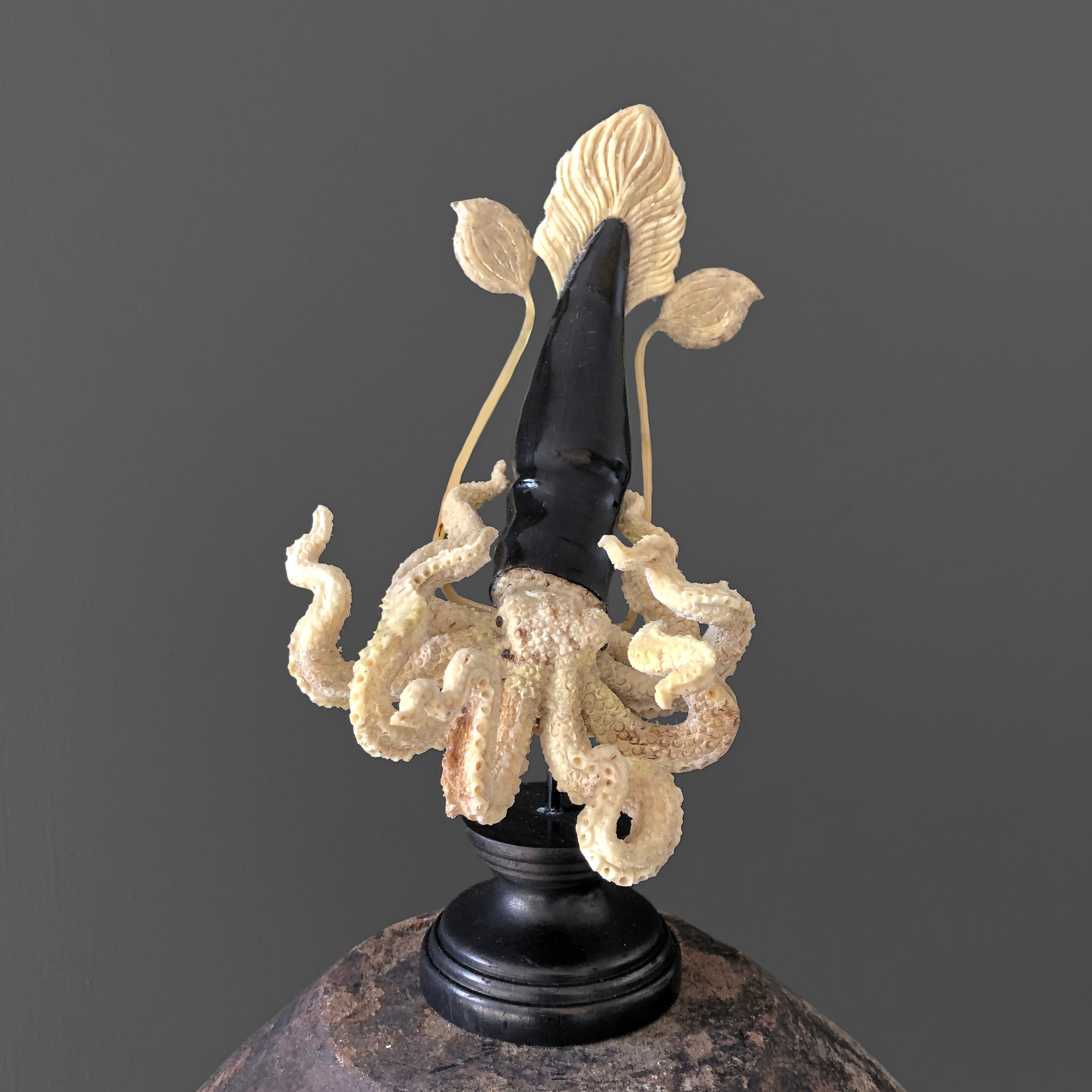 A Stunning Hand Carved Octopus With Horn on a Stand - 7Z/109