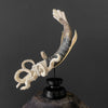 A Stunning Hand Carved Octopus With Horn on a Stand - 7K/109