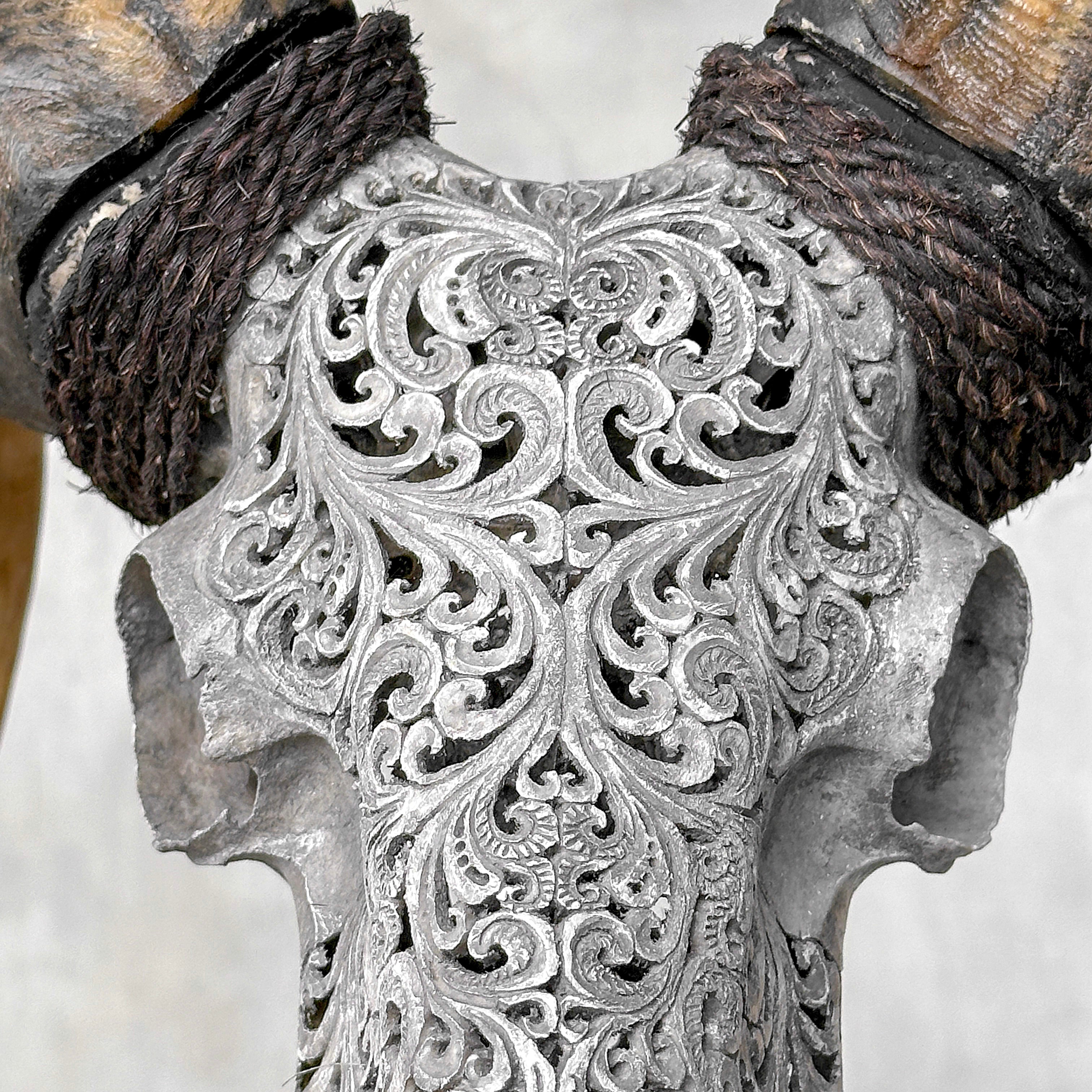 Carved Ram Skull with Tradbal motif on stand - Skull,A/159