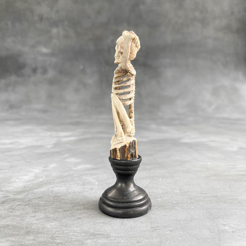 Small bone carving Sitting Human Skull carving 9B/114