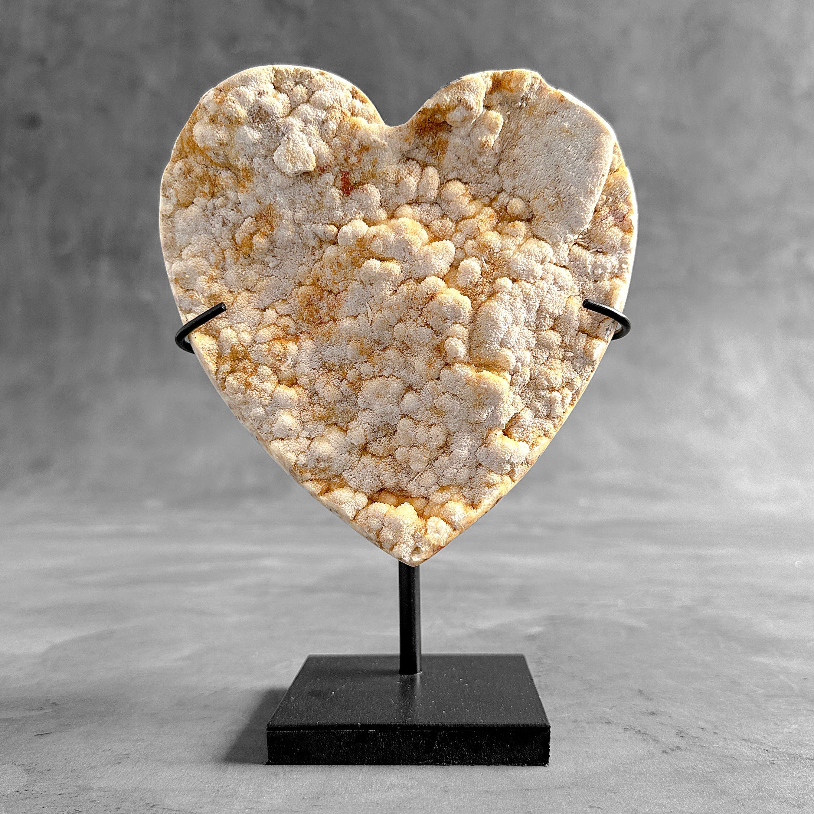 Stunning Heart Shape of Yellow Crystal Rock on a custom stand CH/504