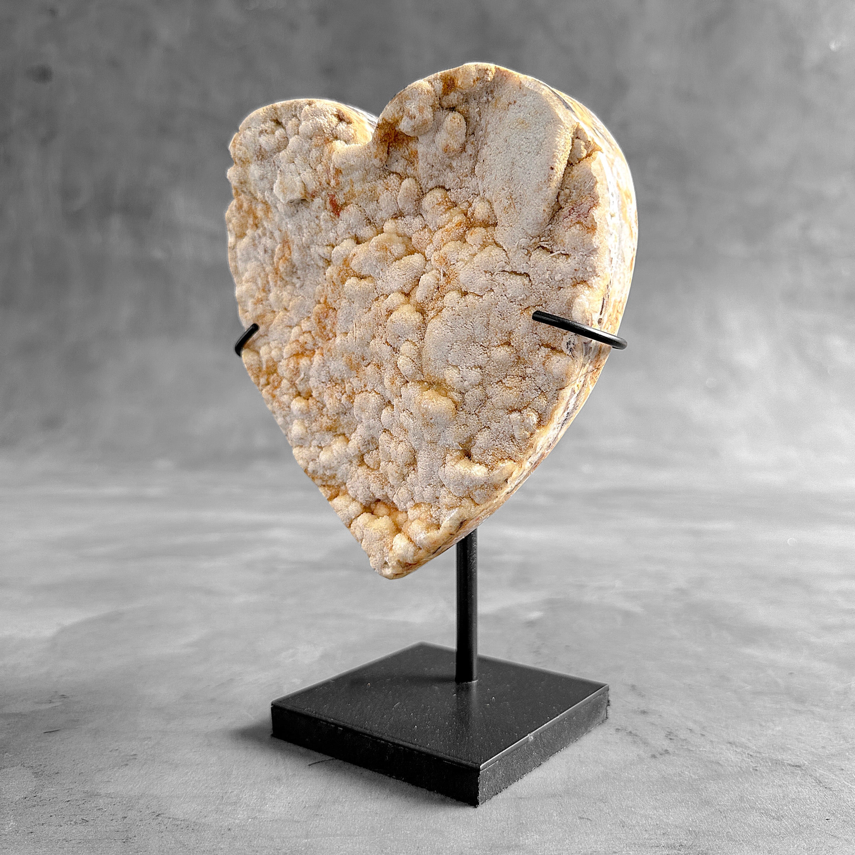 Stunning Heart Shape of Yellow Crystal Rock on a custom stand CH/504