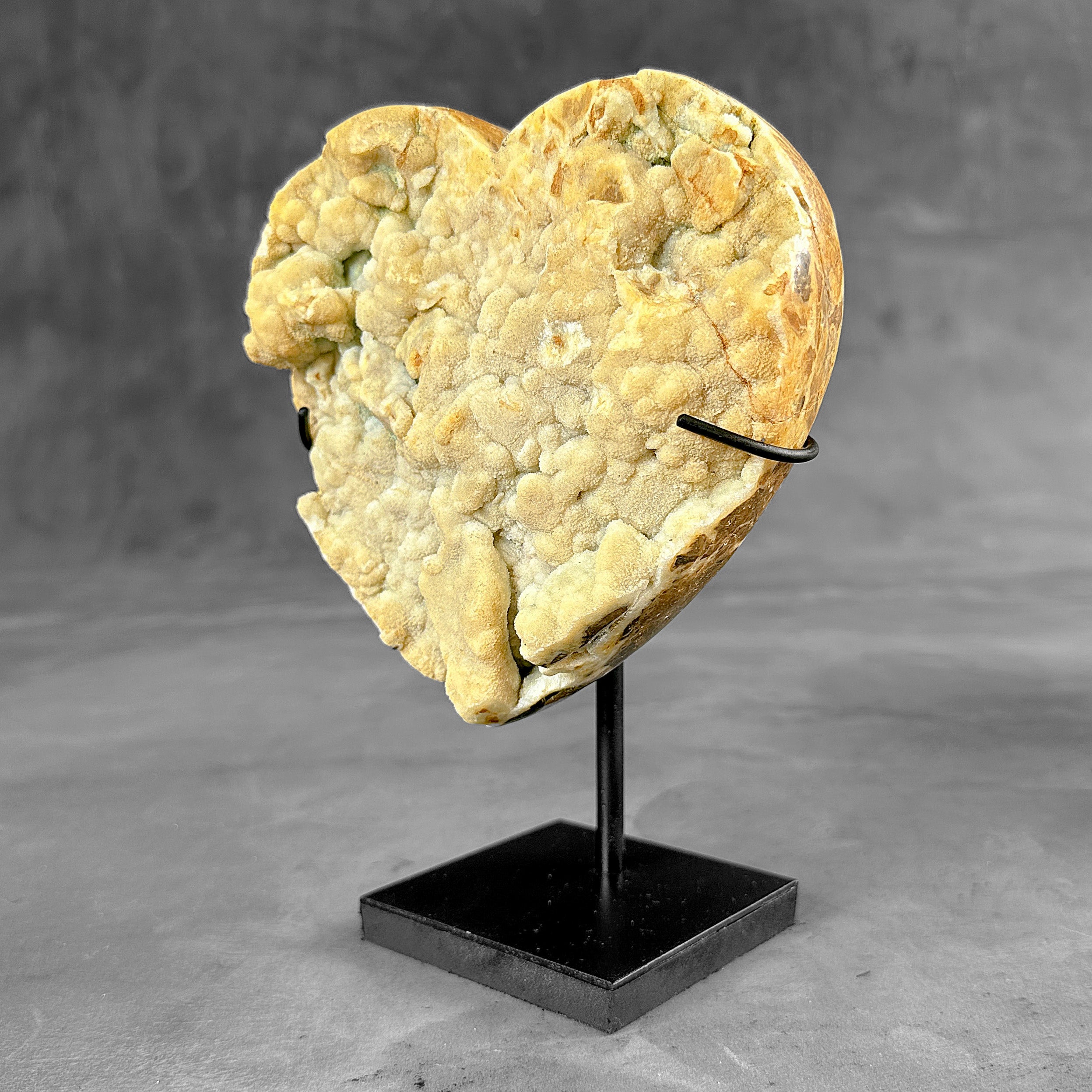 Stunning Heart Shape of Yellow Crystal Rock on a custom stand CH/502