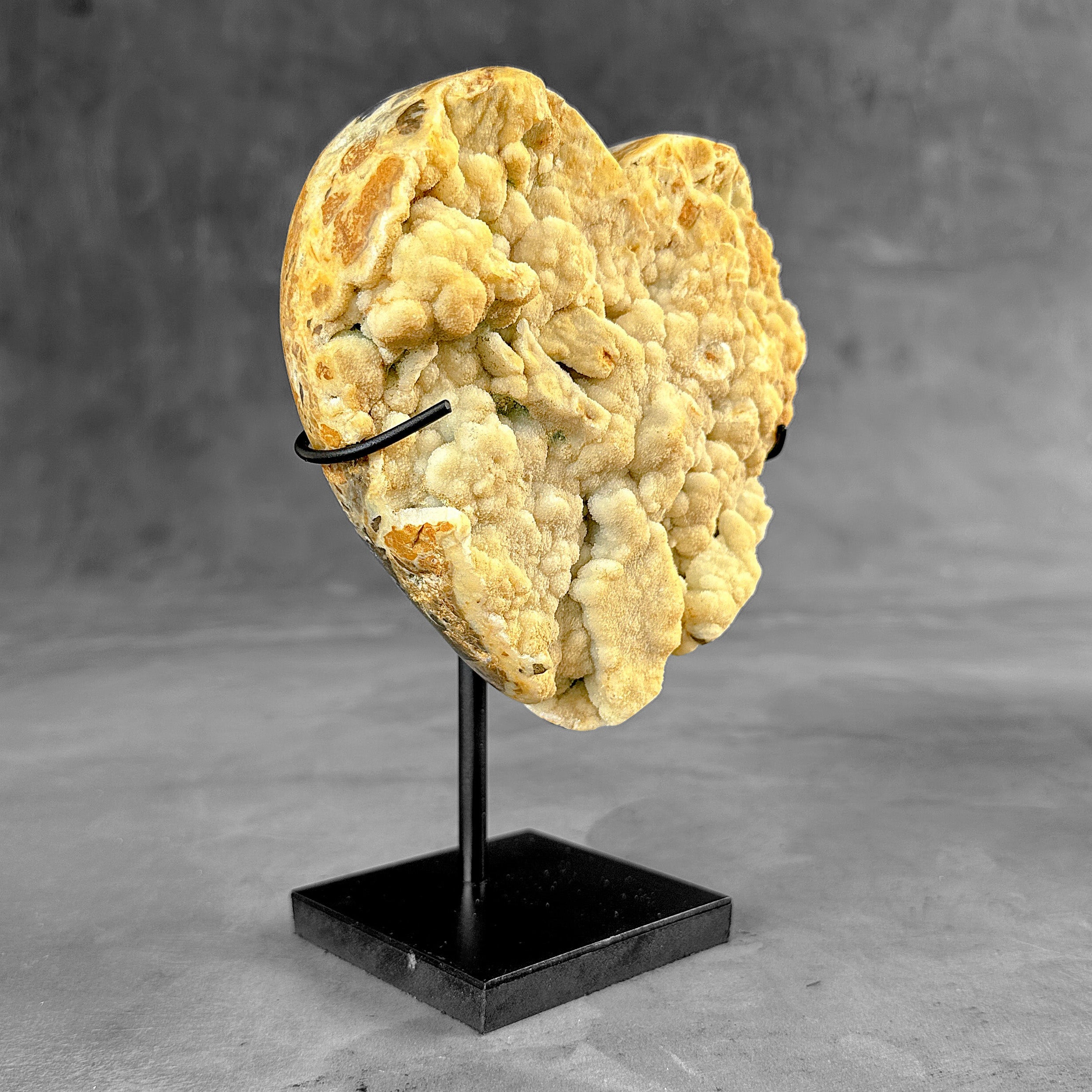 Stunning Heart Shape of Yellow Crystal Rock on a custom stand CH/502