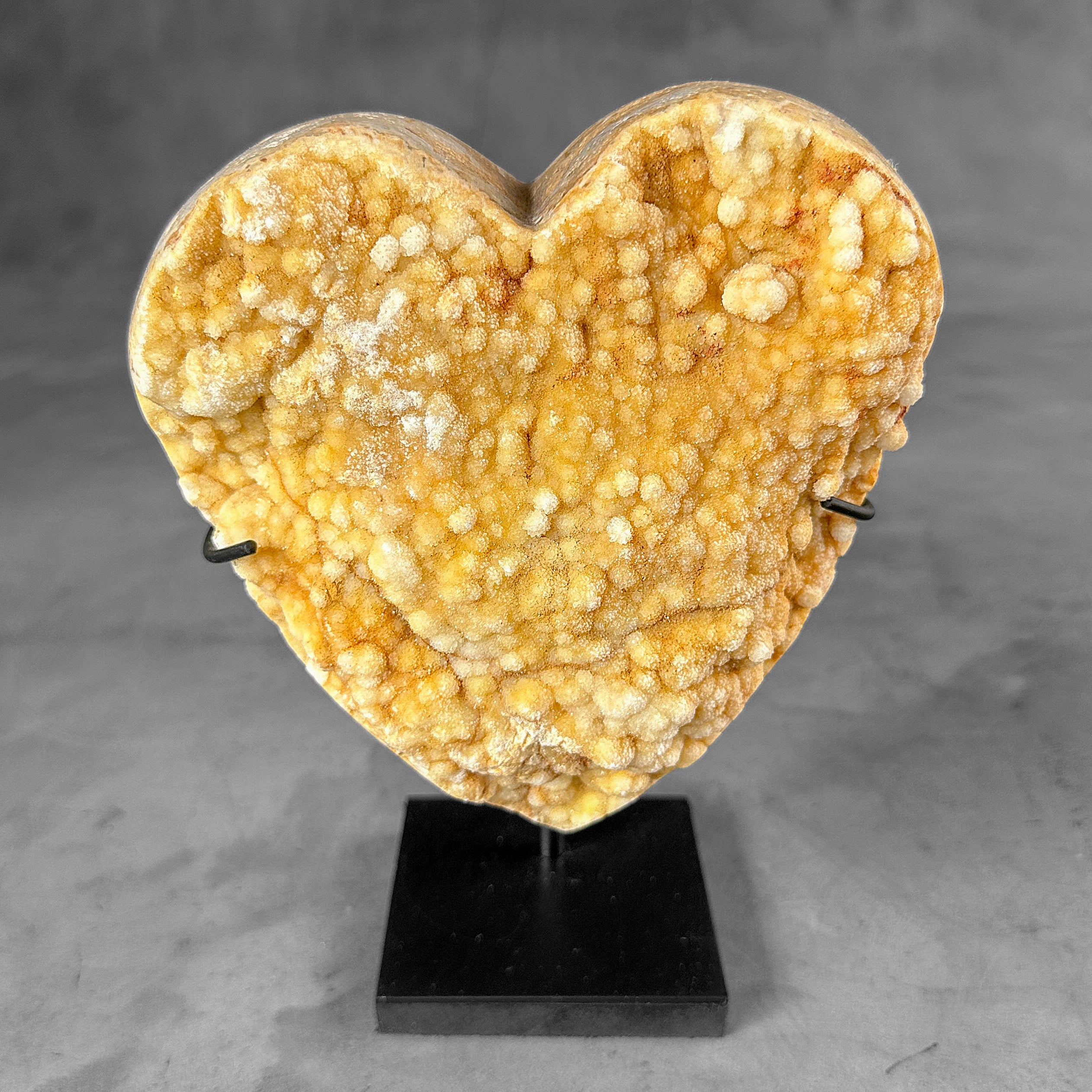 Stunning Heart Shape of Yellow Crystal Rock on a custom stand CH/518