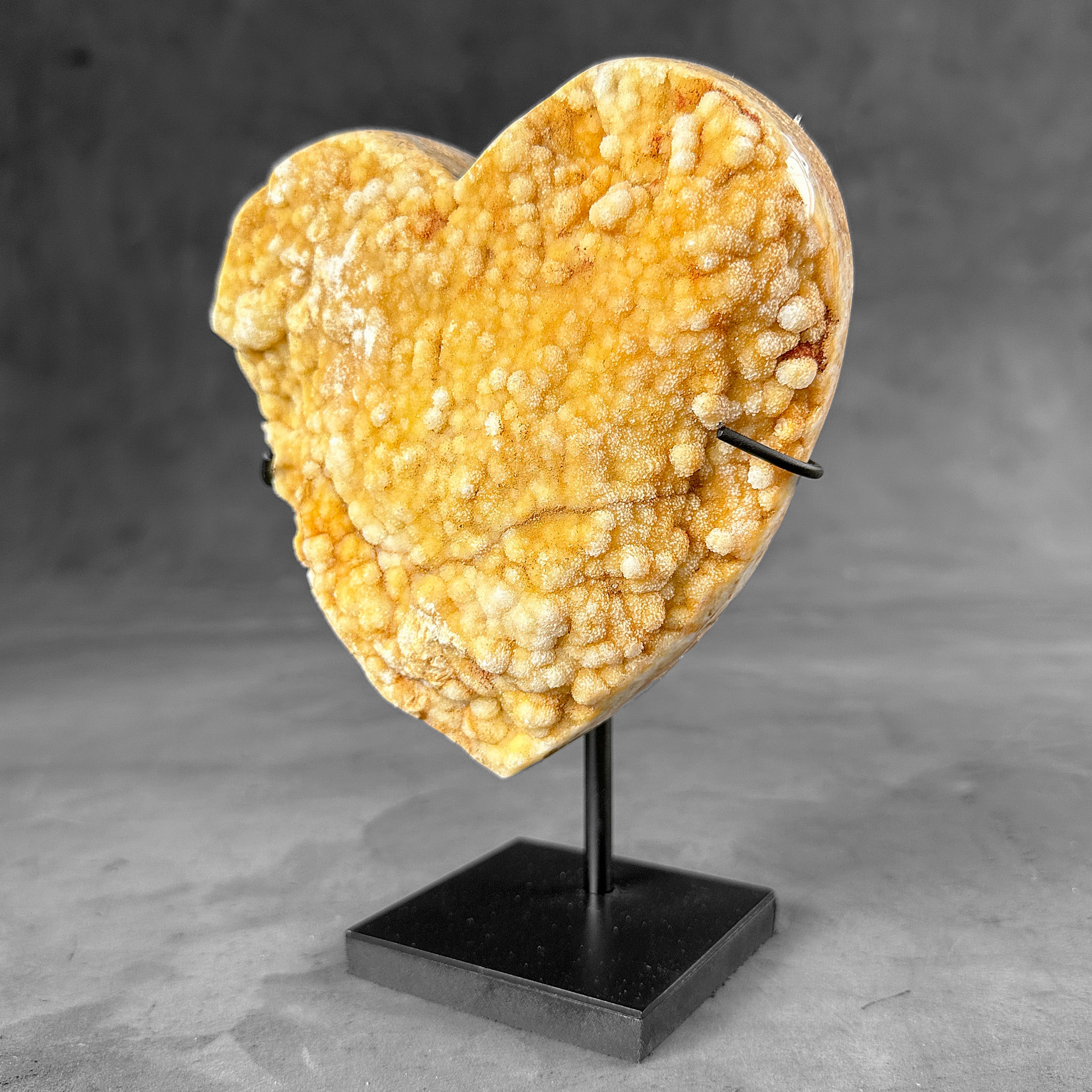 Stunning Heart Shape of Yellow Crystal Rock on a custom stand CH/518