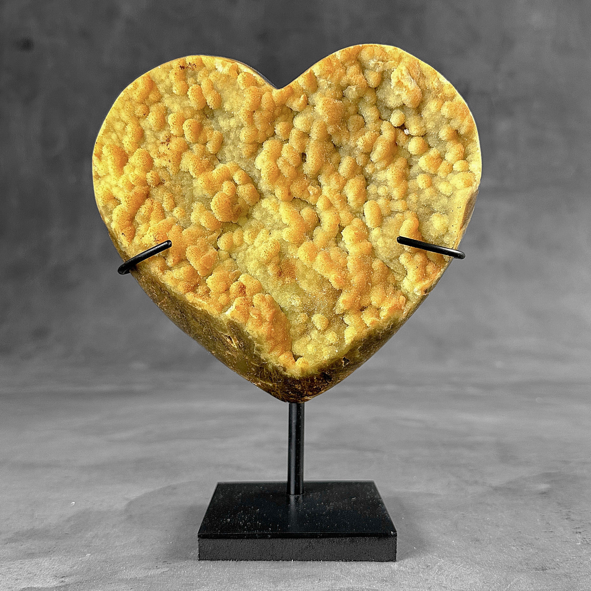 Stunning Heart Shape of Yellow Crystal Rock on a custom stand CH/522