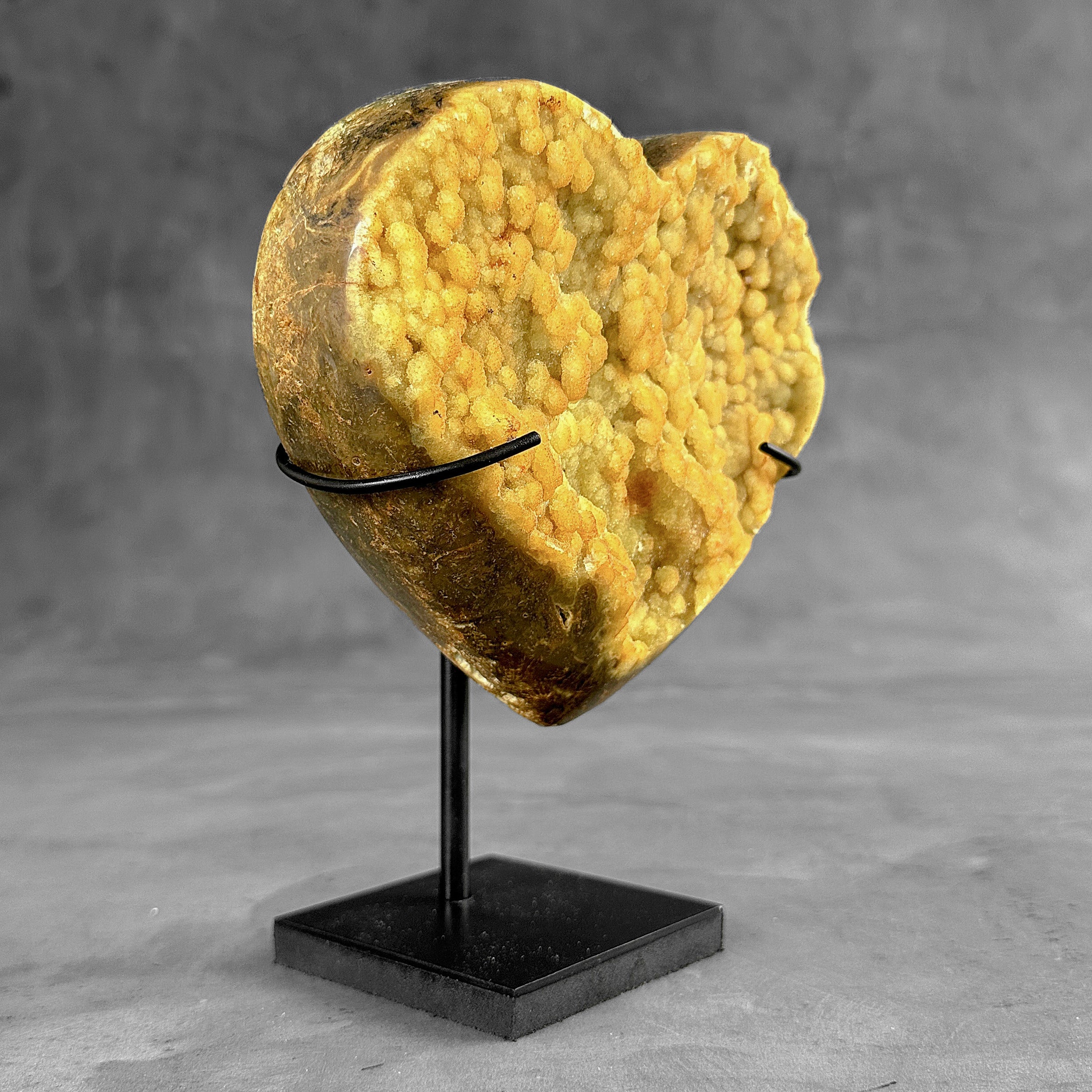 Stunning Heart Shape of Yellow Crystal Rock on a custom stand CH/522