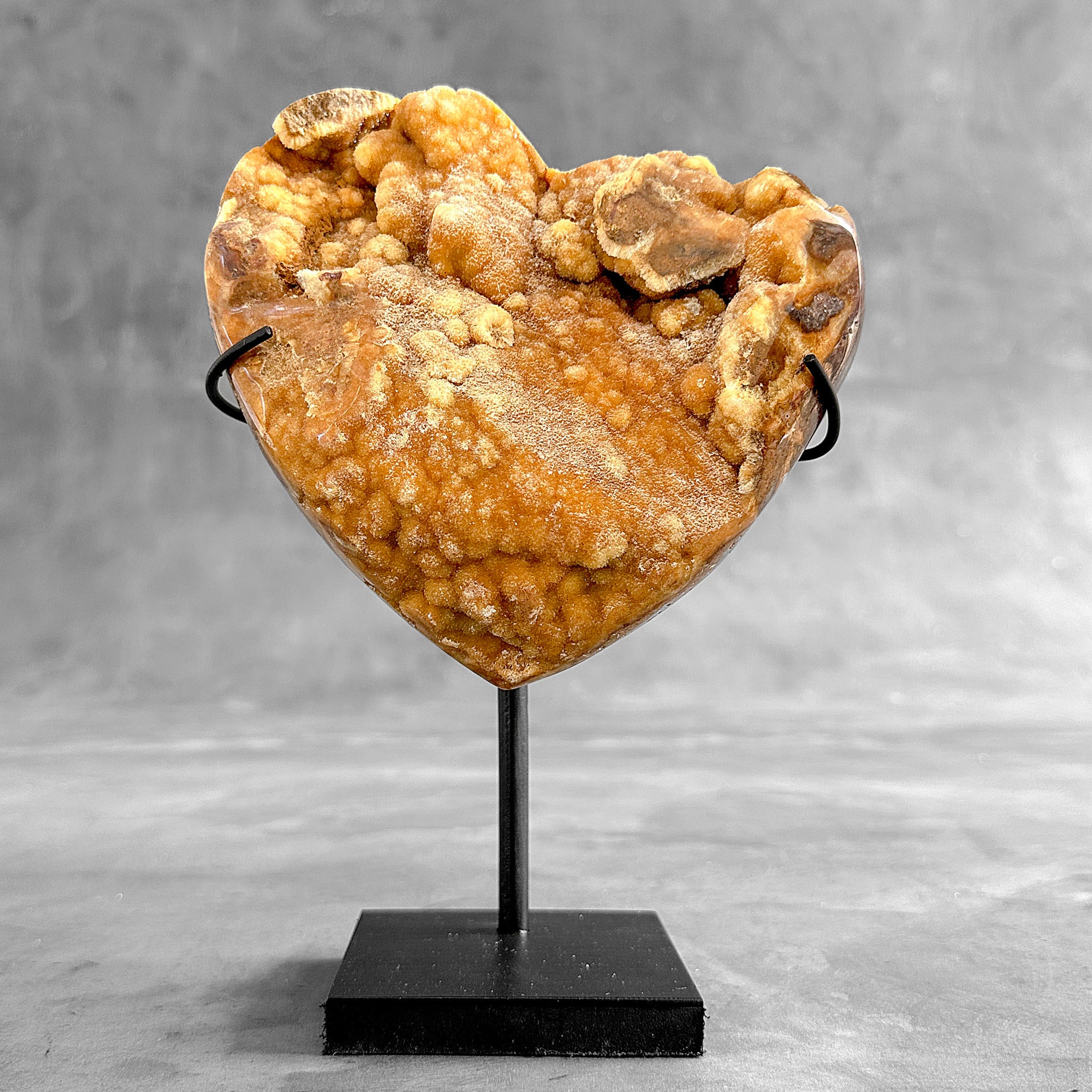 Stunning Heart Shape of Yellow Crystal Rock on a custom stand CH/585