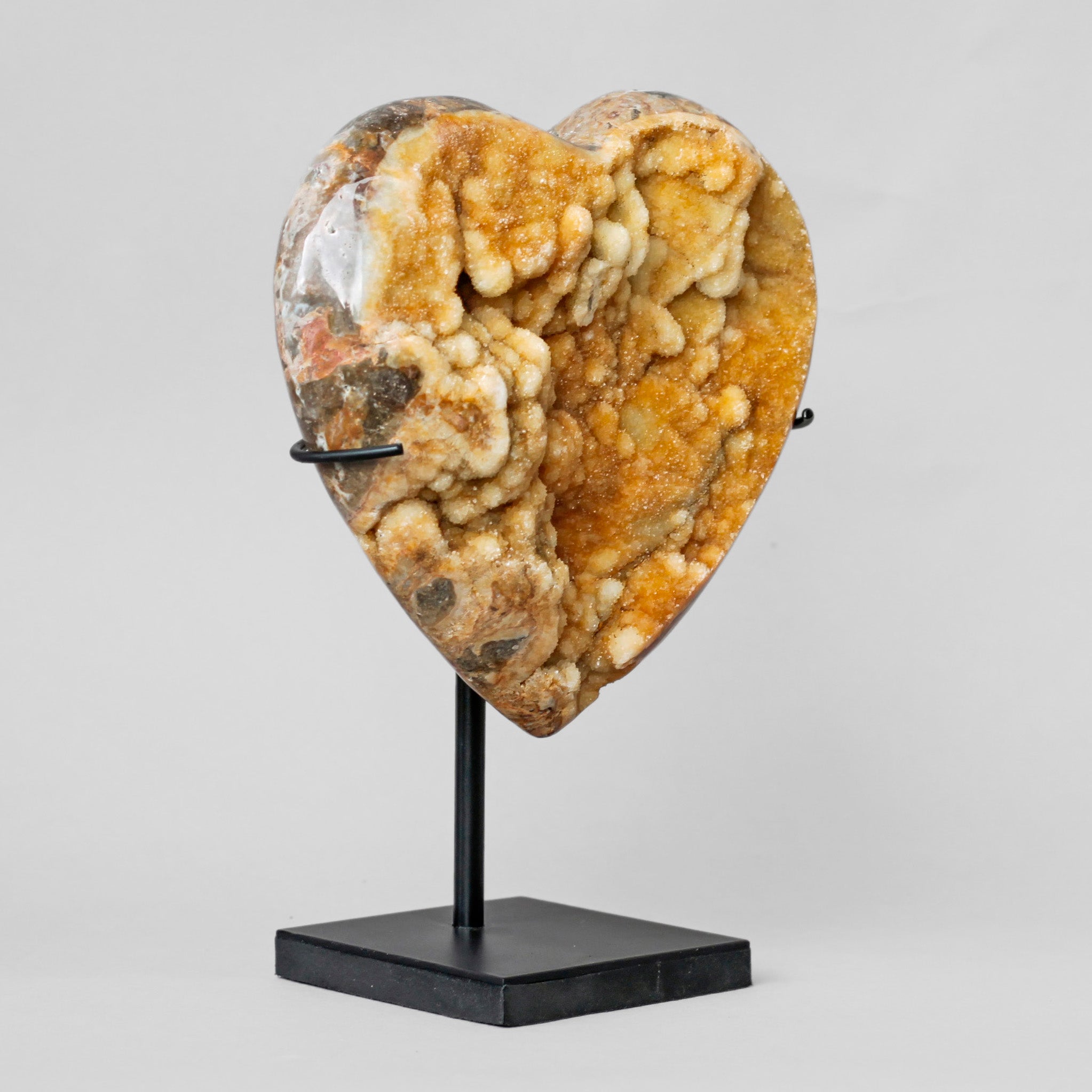 Stunning Heart Shape of Yellow Crystal Rock on a custom stand CH/099